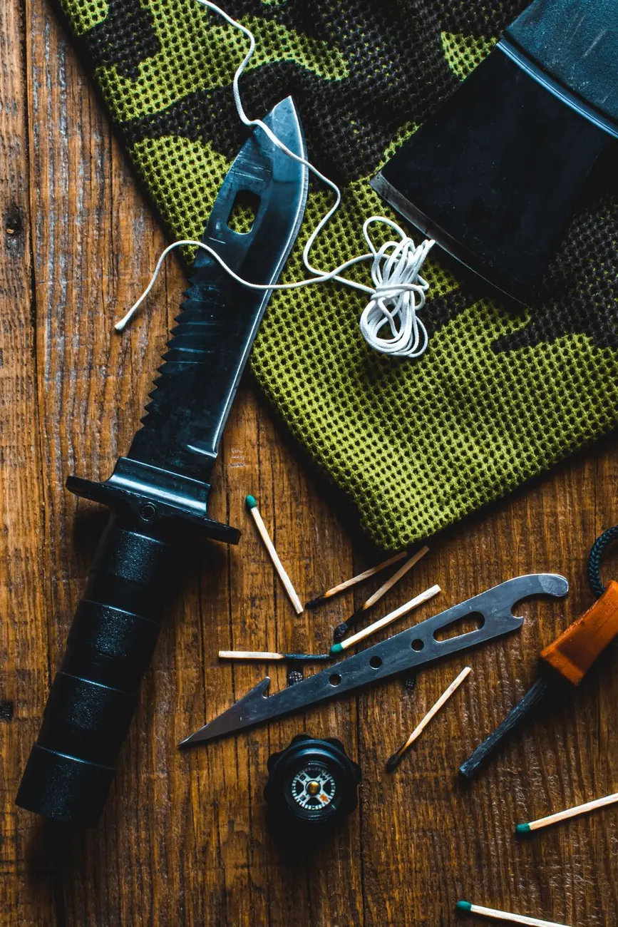 Knife, compass and survival gear
